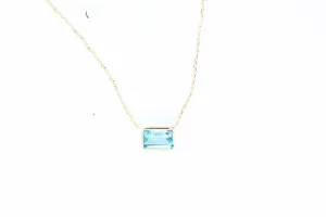 Yellow Gold Emerald Cut Bezel Set Blue Topaz Necklace